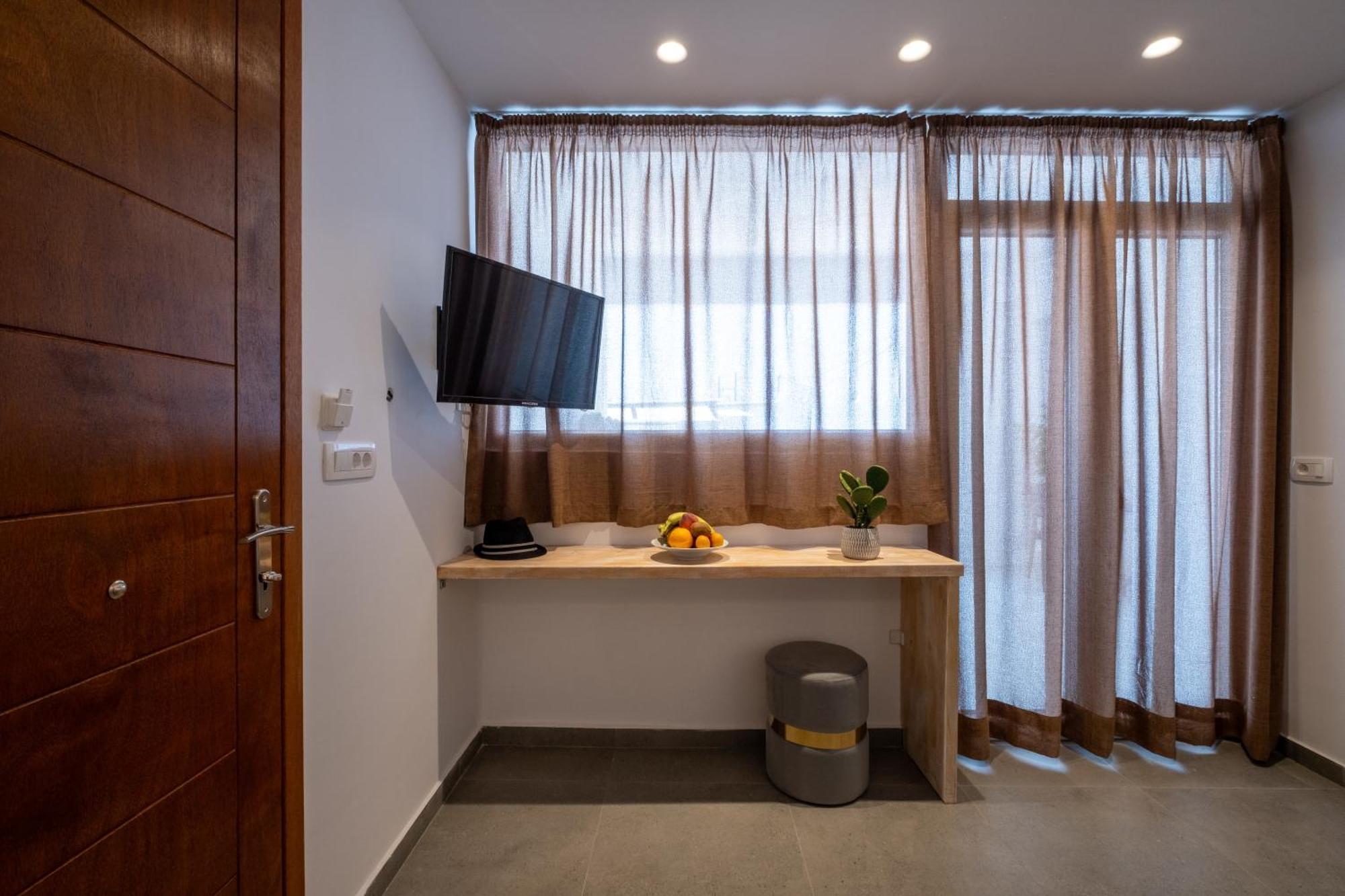 Sand Gem - Beach Apartments เปริโวลอส ภายนอก รูปภาพ
